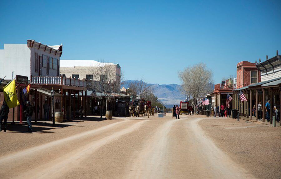 Western-themed dirt alley with historic buildings attraction to visit near Mesa, Arizona